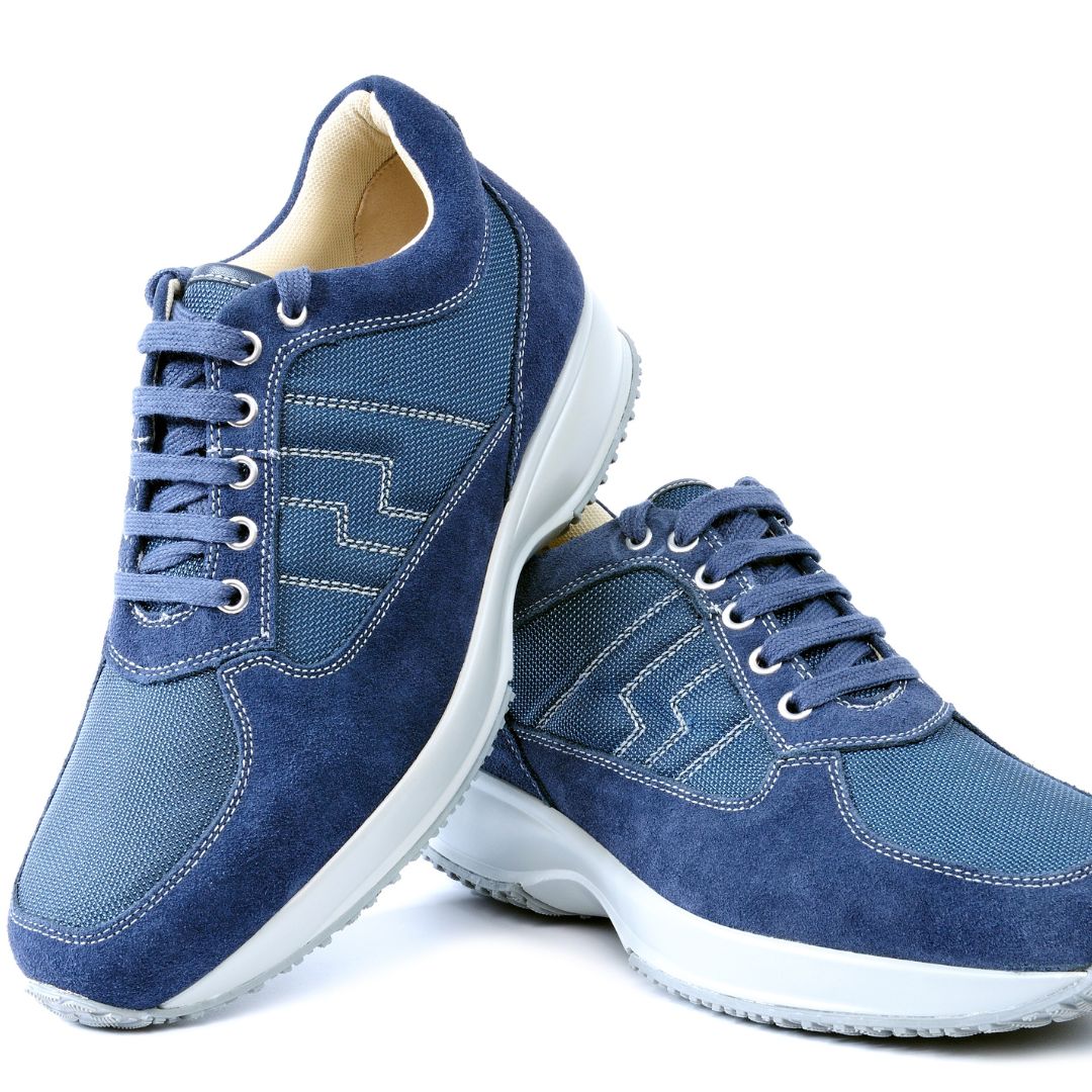 Blue athletic sneakers photographed side by side.