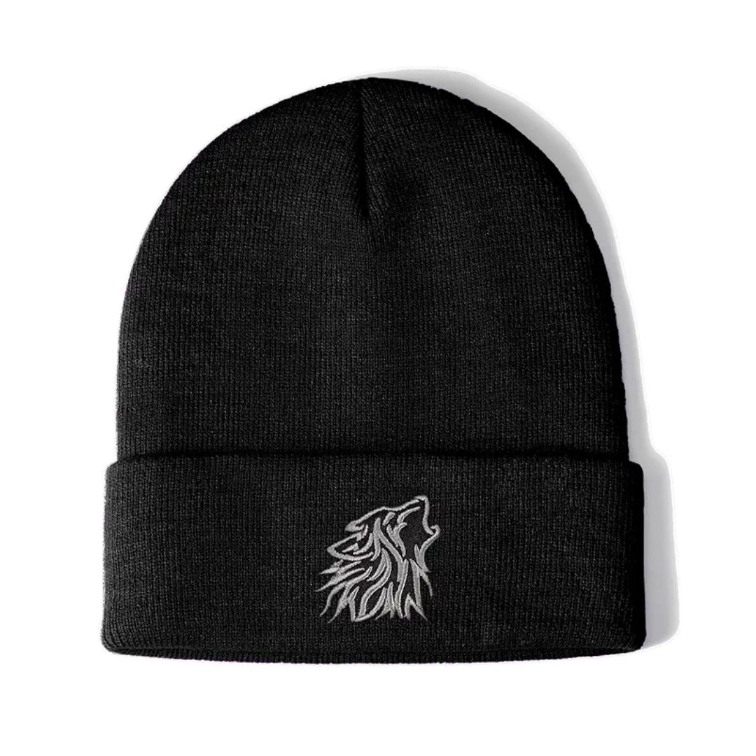 Black knit beanie on a white background.